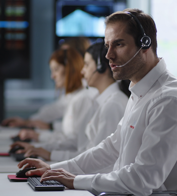 Employee giving customers support 24/7